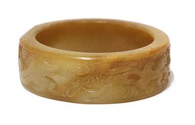 Lot 100 - A Chinese jade bangle