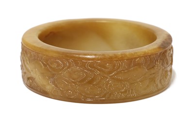 Lot 100 - A Chinese jade bangle