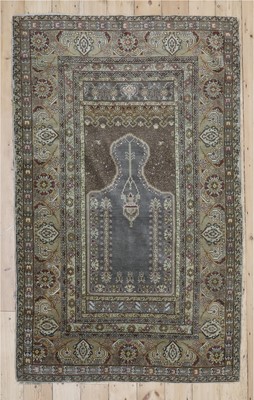 Lot 375A - An antique Eastern prayer rug