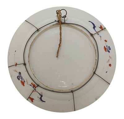 Lot 45 - A Chinese clobbered blue and white charger
