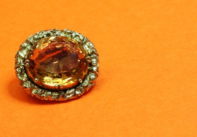 Lot 26 - A William IV gold topaz brooch
