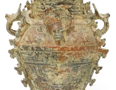 Lot 111 - A Chinese bronze ritual wine vessel and cover (lei)