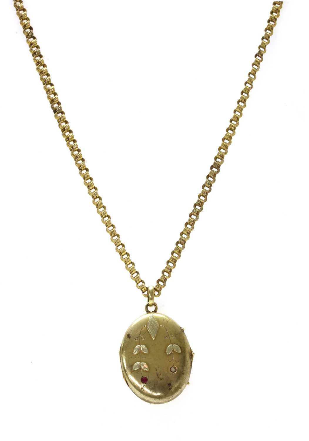 Lot 16 - A Russian gold ruby set locket and chain