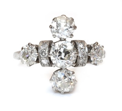 Lot 90 - A five stone diamond cruciform ring