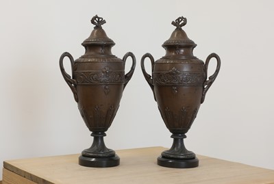 Lot 281 - A pair of spelter urns and covers