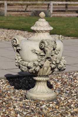 Lot 461 - A composite stone urn and cover