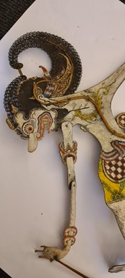 Lot 259 - A collection of Wayang Kulit puppets