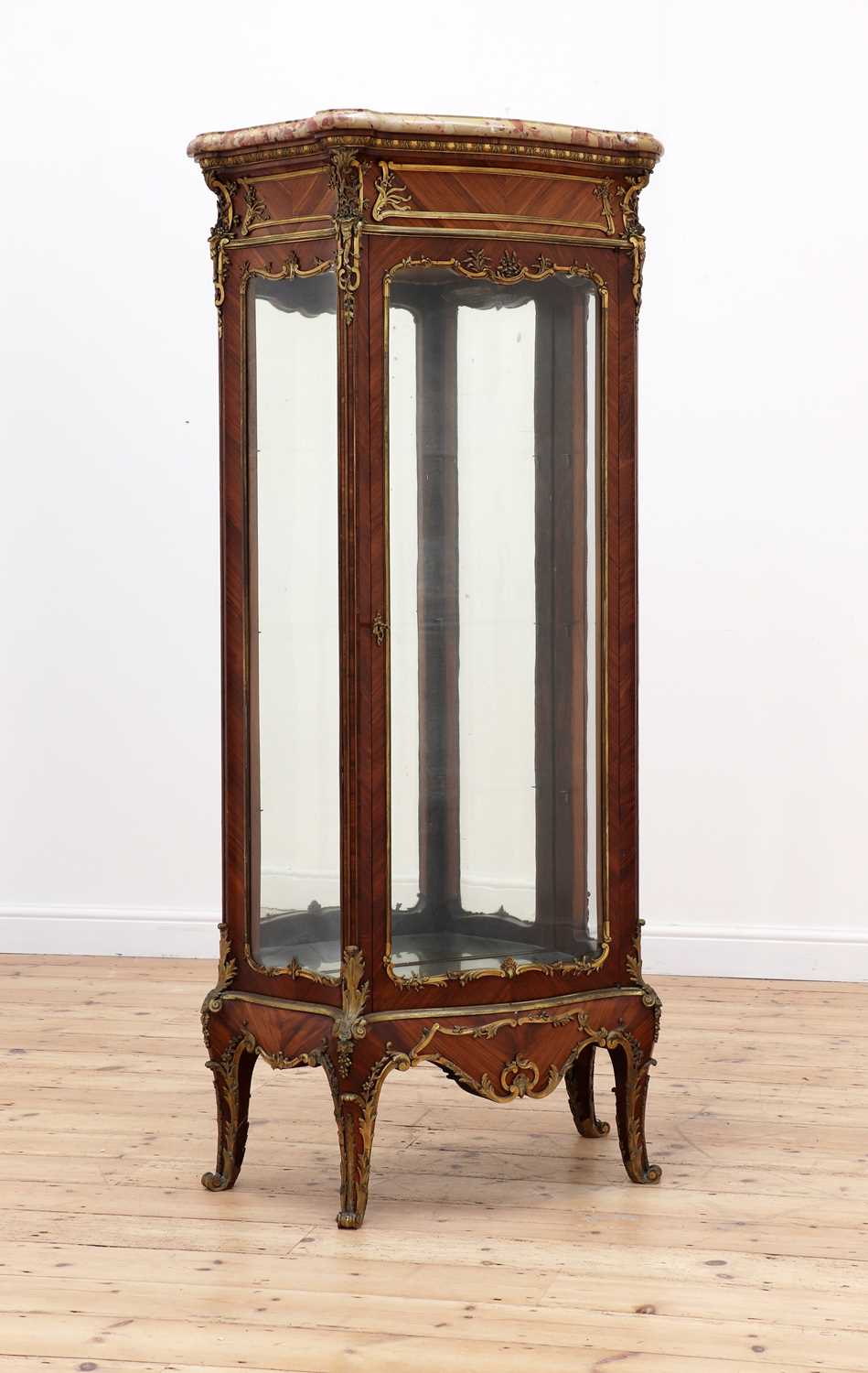 Lot 777 - A Louis XVI-style kingwood vitrine in the manner of François Linke