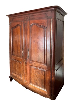 Lot 460 - A Louis XV French chestnut armoire
