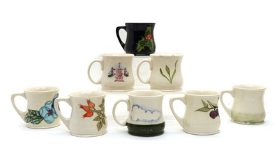 Lot 91 - A collection of Moorcroft pottery mugs