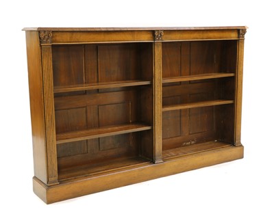 Lot 404 - A walnut open bookcase