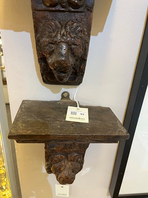 Lot 53 - A pair of early lion mask carved oak corbels