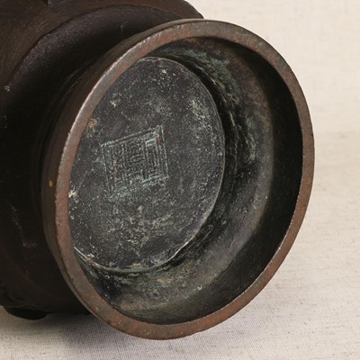 Lot 85 - A Chinese bronze 'arrow' touhu vase