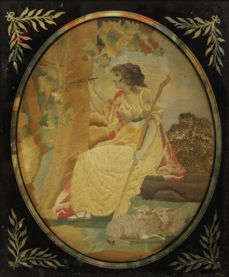 Lot 182 - An oval silkwork picture