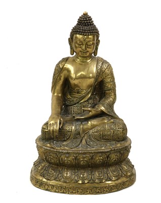 Lot 98 - A Chinese brass Buddha