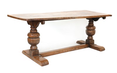 Lot 411 - An oak five plank and cleated end refectory table