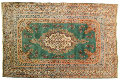 Lot 380 - A Kirman carpet