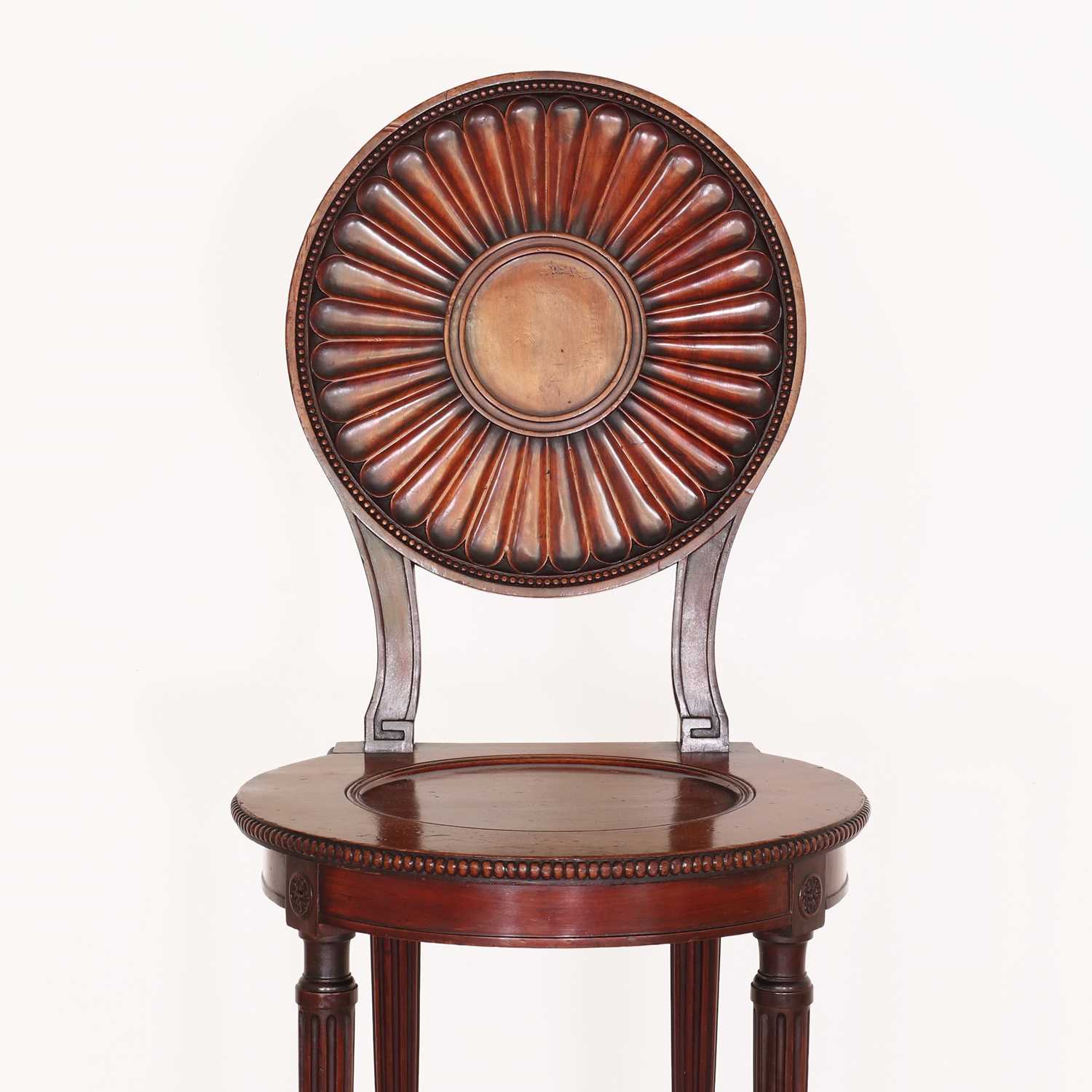 Lot 1 - A George III mahogany hall chair by Thomas Chippendale