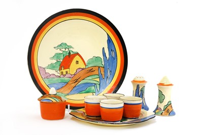Lot 205 - A collection of Clarice Cliff ‘Orange Roof Cottage’ items