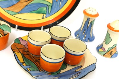 Lot 205 - A collection of Clarice Cliff ‘Orange Roof Cottage’ items