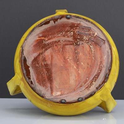 Lot 47 - A rare Liberty & Co. yellow pottery dog bowl
