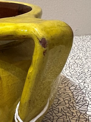 Lot 47 - A rare Liberty & Co. yellow pottery dog bowl