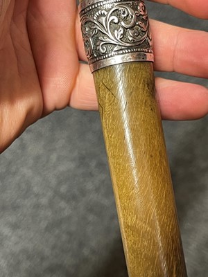 Lot 110 - A rhinoceros horn walking stick