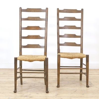 Lot 59 - A pair of Arts and Crafts oak side chairs