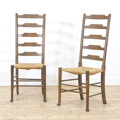 Lot 59 - A pair of Arts and Crafts oak side chairs