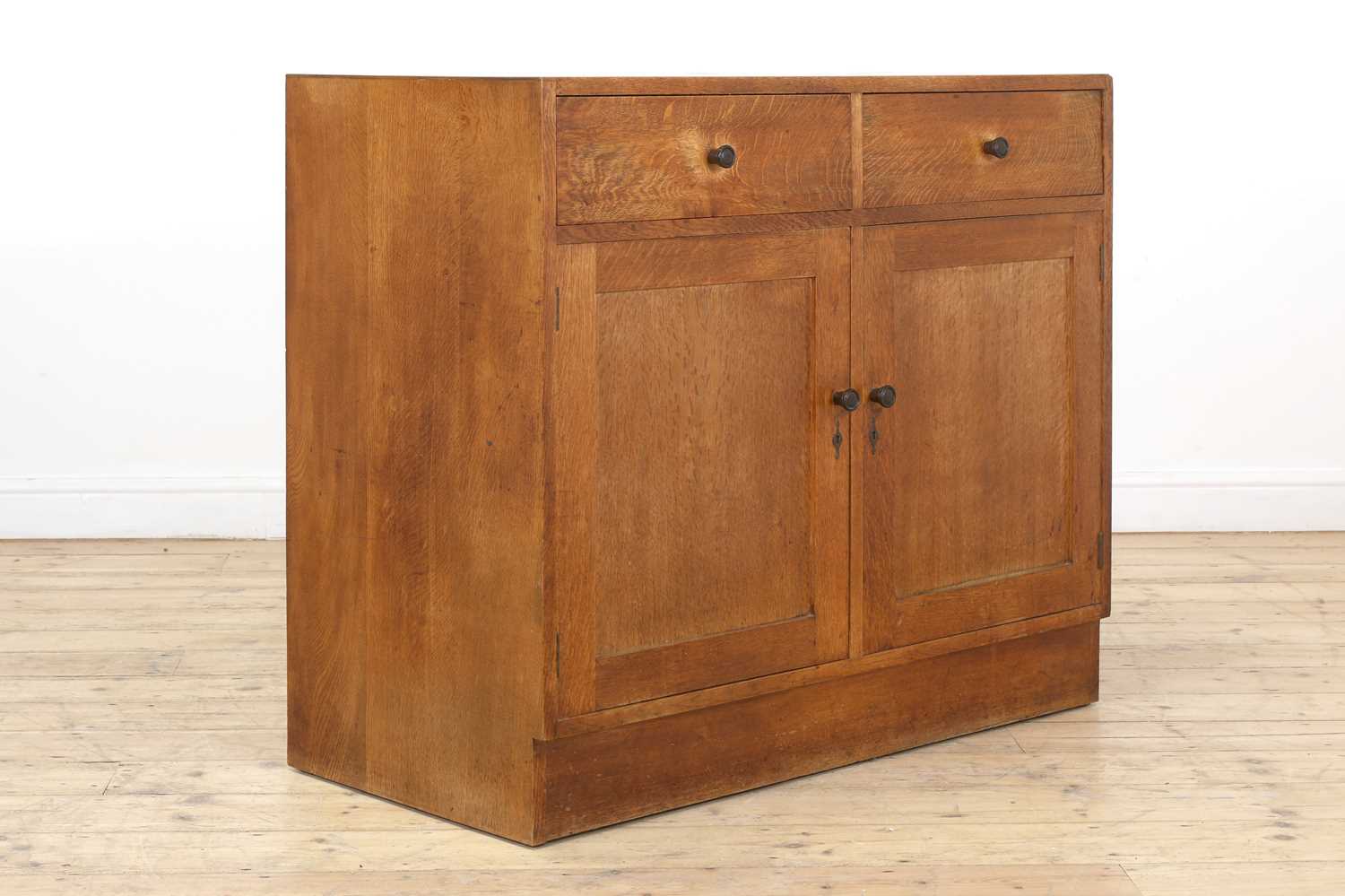 Lot 214 - A Gordon Russell oak sideboard