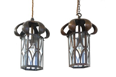 Lot 64 - A pair of Arts and Crafts copper hanging lanterns