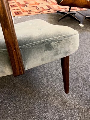 Lot 255 - A pair of upholstered wingback armchairs