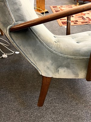 Lot 255 - A pair of upholstered wingback armchairs