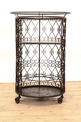 Lot 280 - A patinated metal bar cart