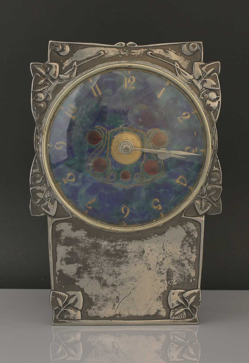 Lot 26 - A Liberty & Co. Tudric pewter and enamel mantel clock