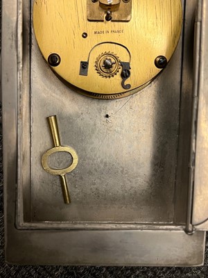 Lot 26 - A Liberty & Co. Tudric pewter and enamel mantel clock