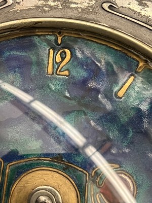 Lot 26 - A Liberty & Co. Tudric pewter and enamel mantel clock