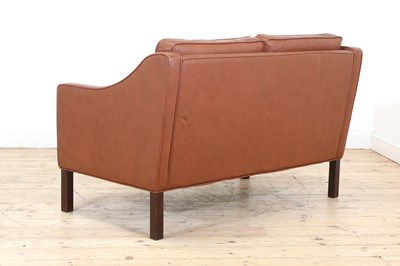 Lot 323 - A Danish brown leather two-seater settee