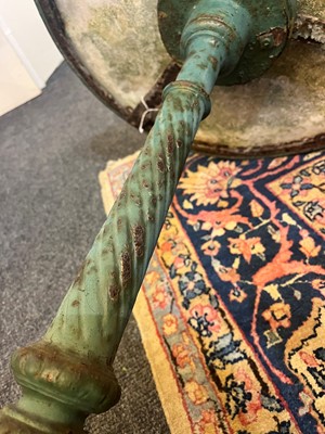 Lot 398 - A painted cast iron garden table
