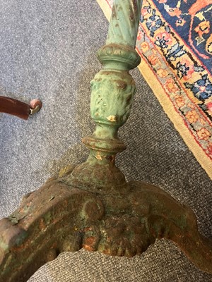 Lot 398 - A painted cast iron garden table