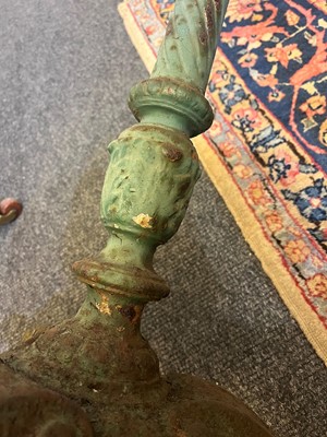 Lot 398 - A painted cast iron garden table