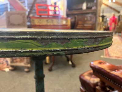 Lot 398 - A painted cast iron garden table