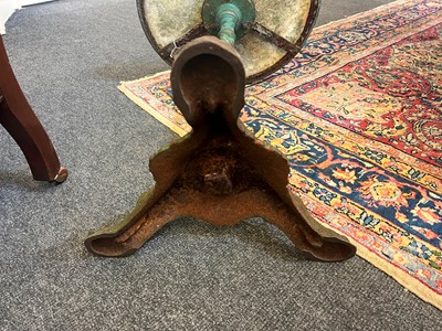 Lot 398 - A painted cast iron garden table