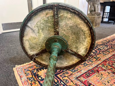 Lot 398 - A painted cast iron garden table