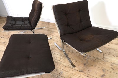Lot 260 - A pair of Westnofa chrome and leather loungers