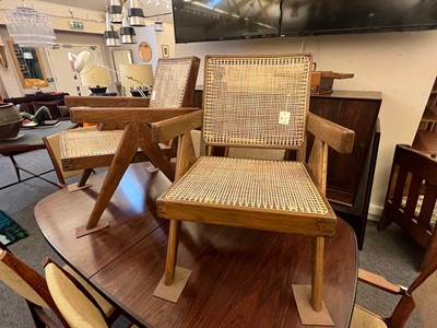 Lot 208 - A pair of teak 'Low Easy Chair' armchairs