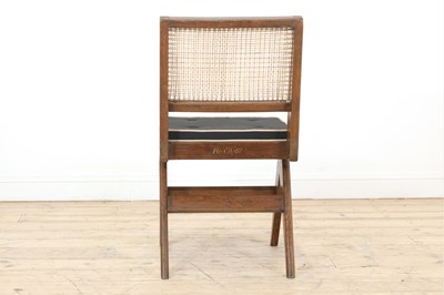Lot 205 - A teak armless chair