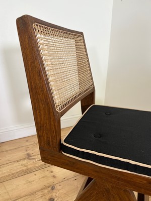 Lot 205 - A teak armless chair