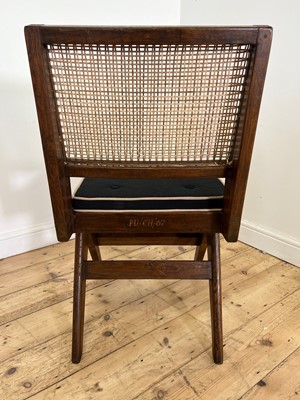 Lot 205 - A teak armless chair