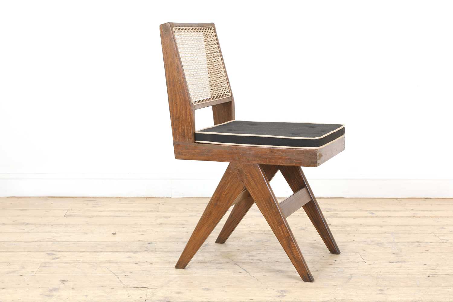 Lot 205 - A teak armless chair